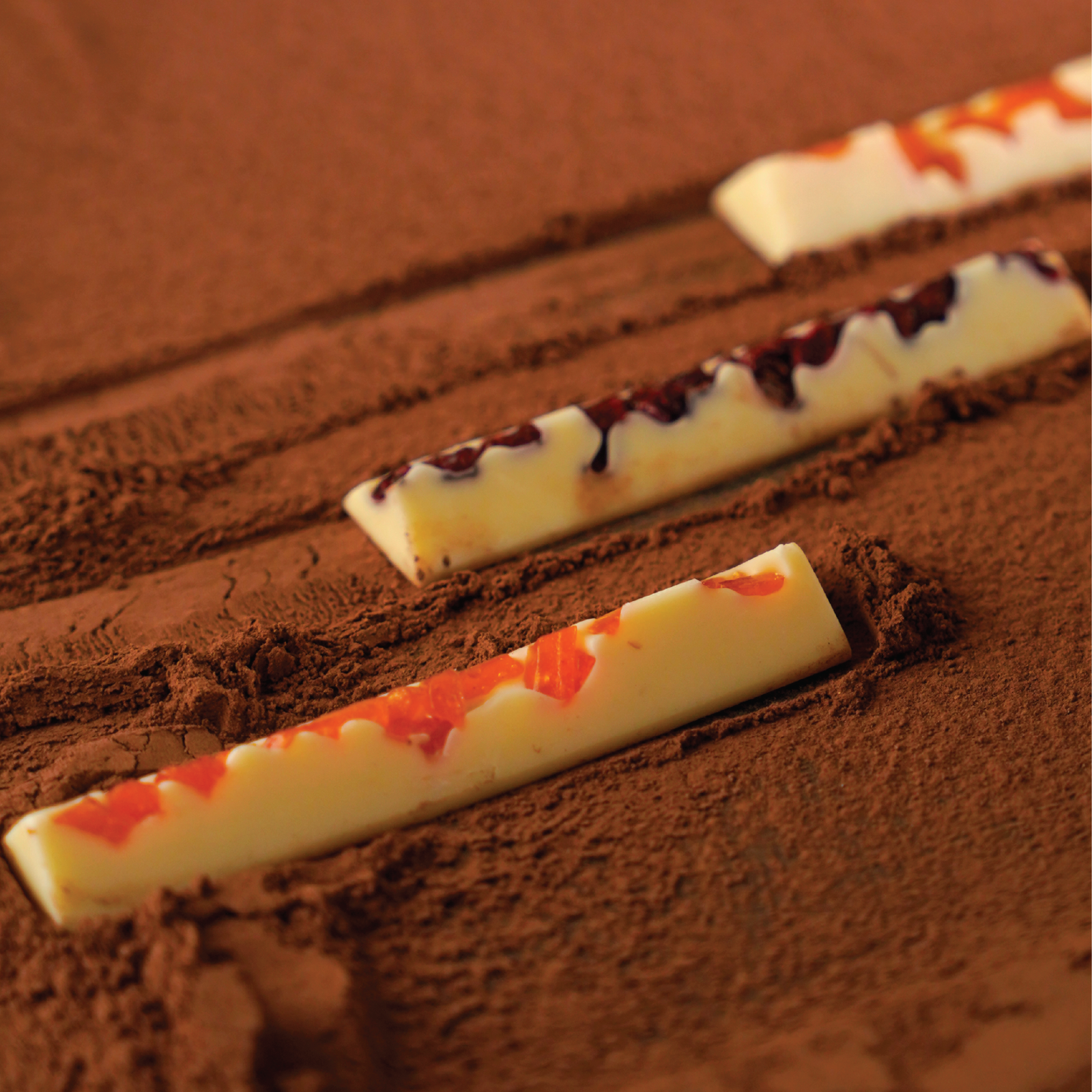 White Chocolate Batons with Nuts and Dried Fruits.